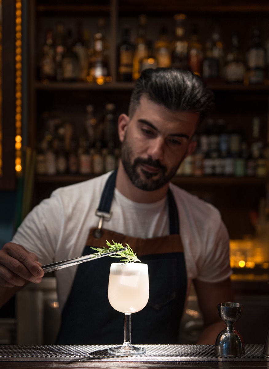 In this picture: Bartender Nikos Gartzolakis preparing 'Love of Zero' sugnature drink, Baba Au Rum, Syntagma, Athens, Greece. Athens, Food and Drinks,