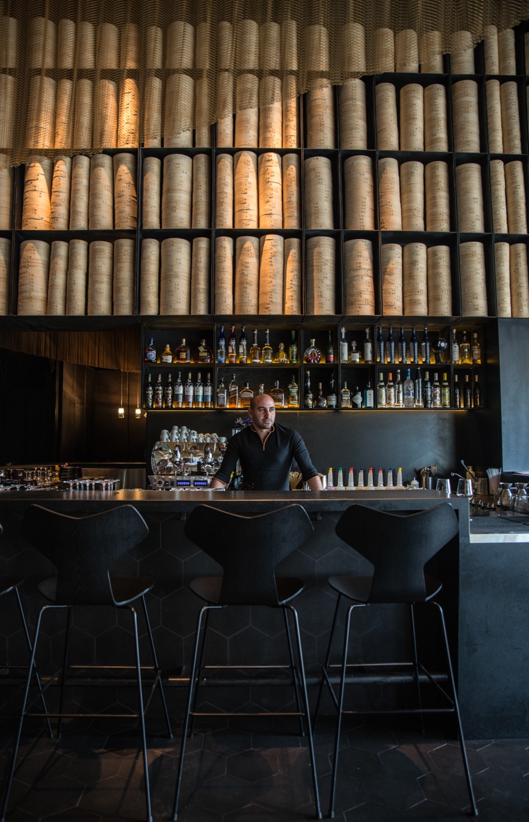 In this picture: ISRAEL, Tel Aviv, portrait of a bartender in Topolopompo restaurant. Asian Cuisine, Bartender, Black and Gold, Decor, Design, High Chairs,