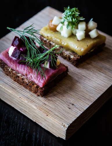 Small danish smorrebrod of herring fish served as part of the Ammanns Lunch, Aamanns Restaurant, Copenhagen, Denmark.. Aamanns, Denmark, Europe, Scandinavia,. Denmark, Copenhagen