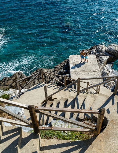 The stairs leading to Mylopotamos beach near Tsagarada, Pelion peninsula, Greece.. Mylopotamos, Pelion, beach, coast, coastline, greece, landscape, mediterranean,. Greece,