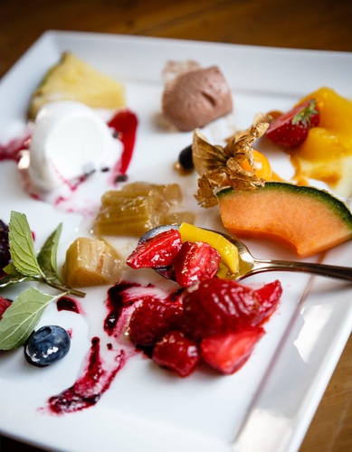 Desert plate at the Gammelbua restaurant in Reine Rorbuer Hotel, Reine, Lofoten Islands, Norway.. Restaurant, food, dish, plate, desert, Lofoten, Islands,. Norway,